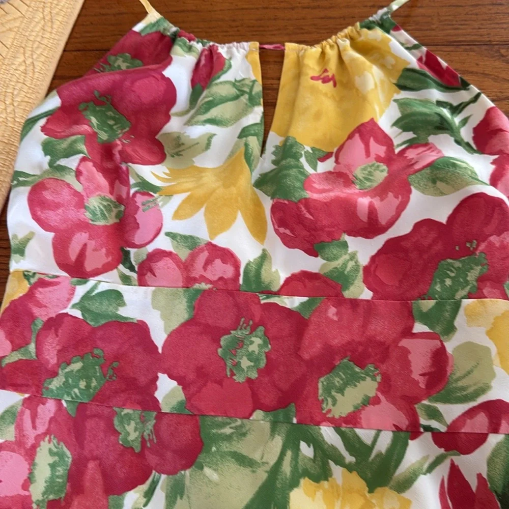 Silk dress lined in polyester. Zips on the side seam. - Picture 4 of 4